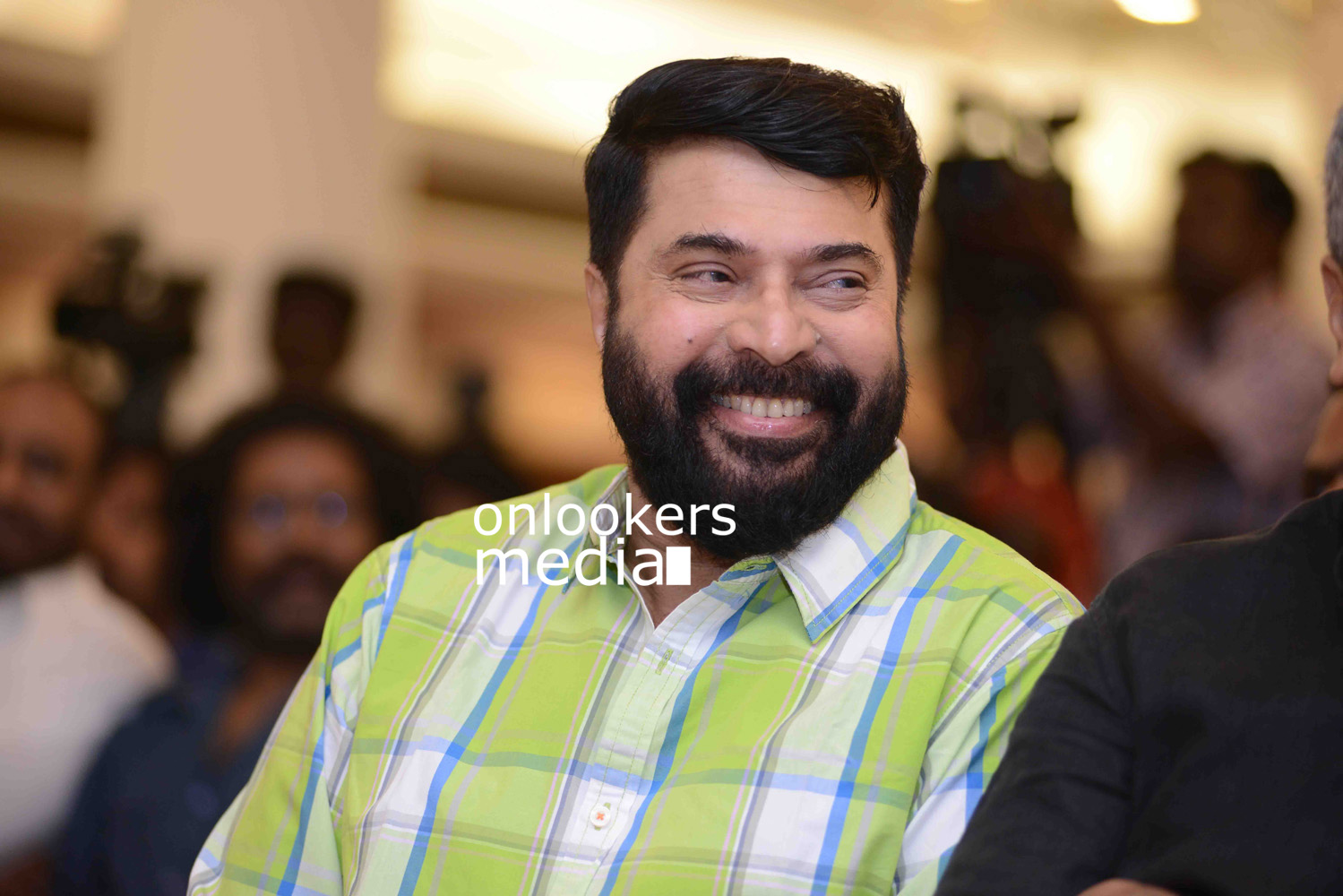 https://onlookersmedia.in/wp-content/uploads/2016/09/Mammootty-The-Great-Father-beard-look-thoppil-joppan-audio-launch-10.jpg