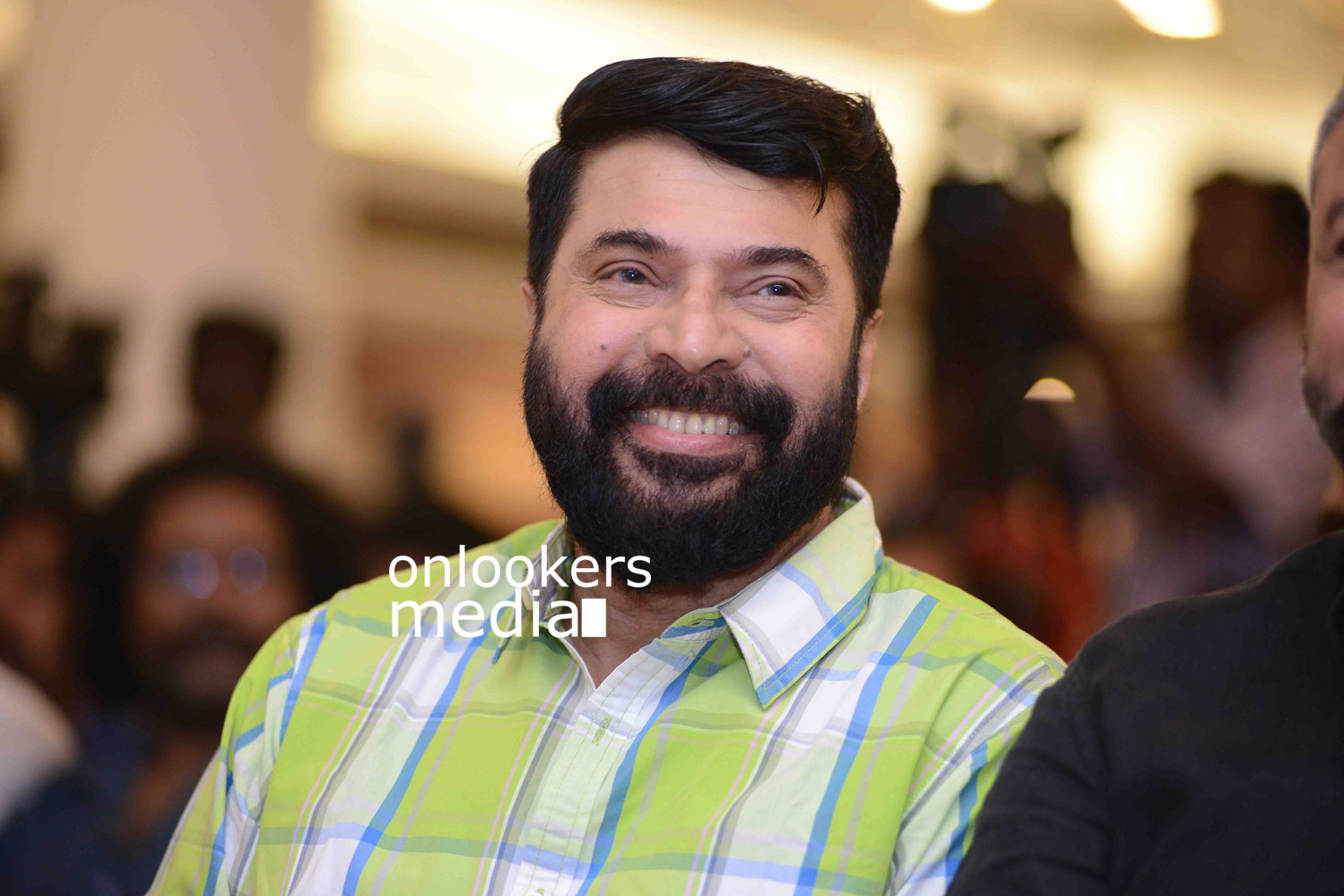 https://onlookersmedia.in/wp-content/uploads/2016/09/Mammootty-The-Great-Father-beard-look-thoppil-joppan-audio-launch-11.jpg