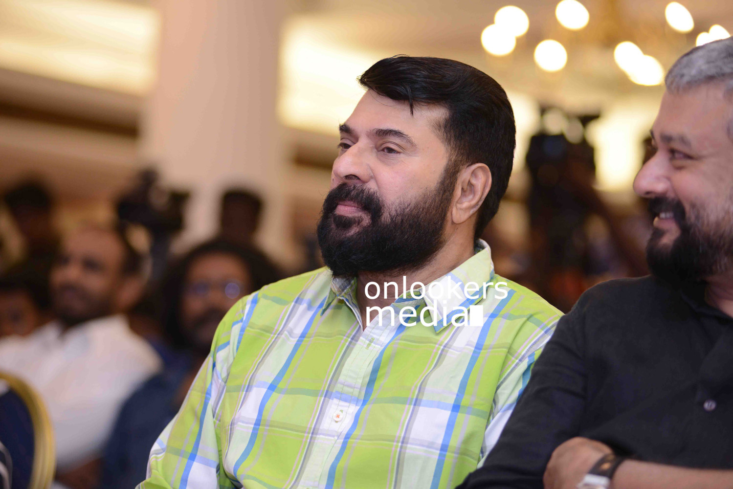 https://onlookersmedia.in/wp-content/uploads/2016/09/Mammootty-The-Great-Father-beard-look-thoppil-joppan-audio-launch-13.jpg