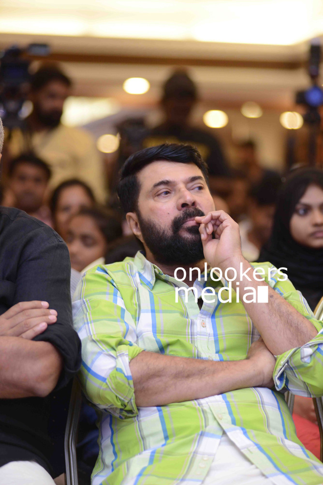 https://onlookersmedia.in/wp-content/uploads/2016/09/Mammootty-The-Great-Father-beard-look-thoppil-joppan-audio-launch-17.jpg