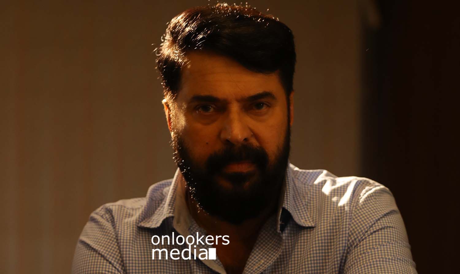 https://onlookersmedia.in/wp-content/uploads/2017/03/Mammootty-in-The-Great-Father-Stills-Photos-14.jpg